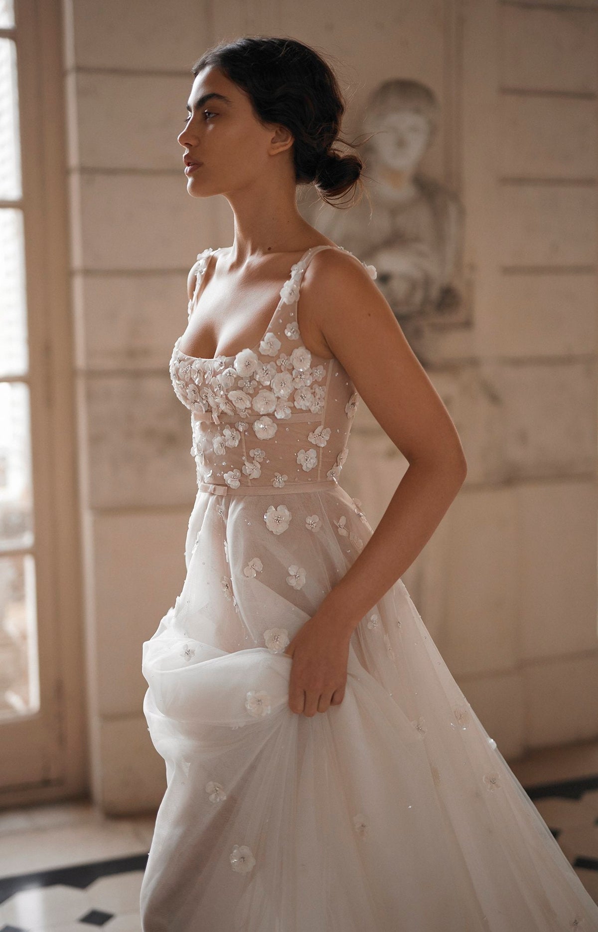 From the waist down, this dress will have a chiffon layer underneath which comes in a default blush colour but is also available in ivory if requested.&nbsp;